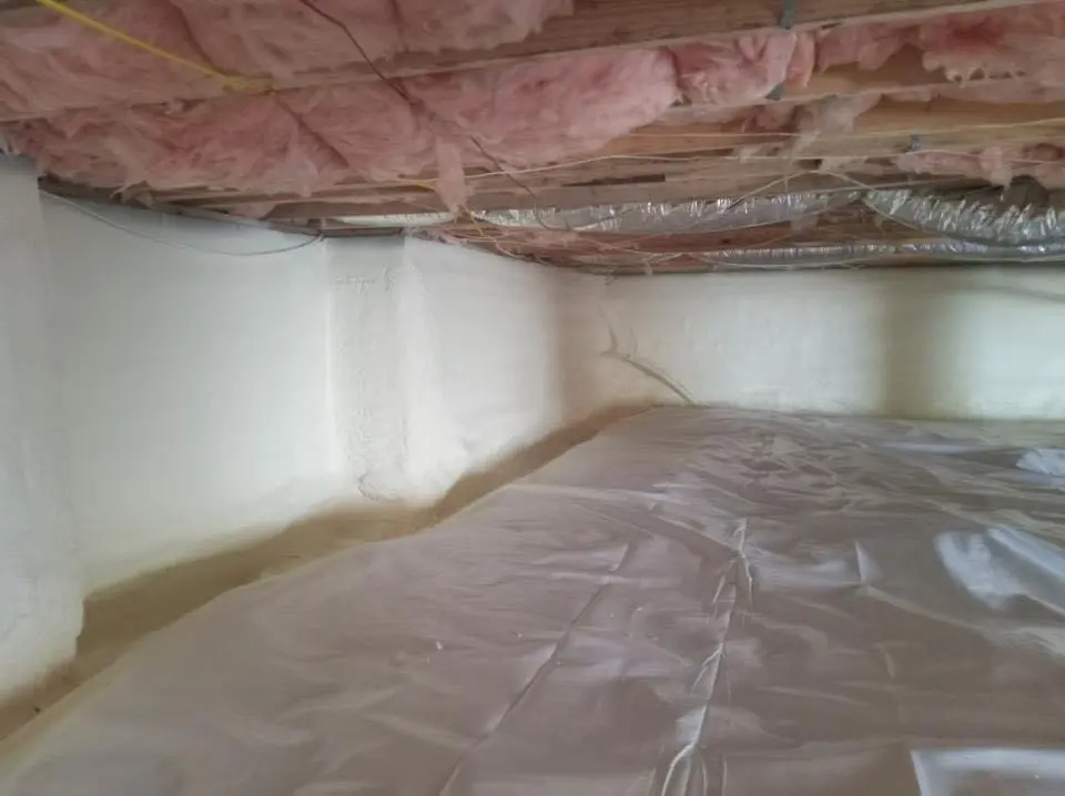 Crawl space encapsulation with closed-cell spray foam for Commercial Roof Restoration in Columbine